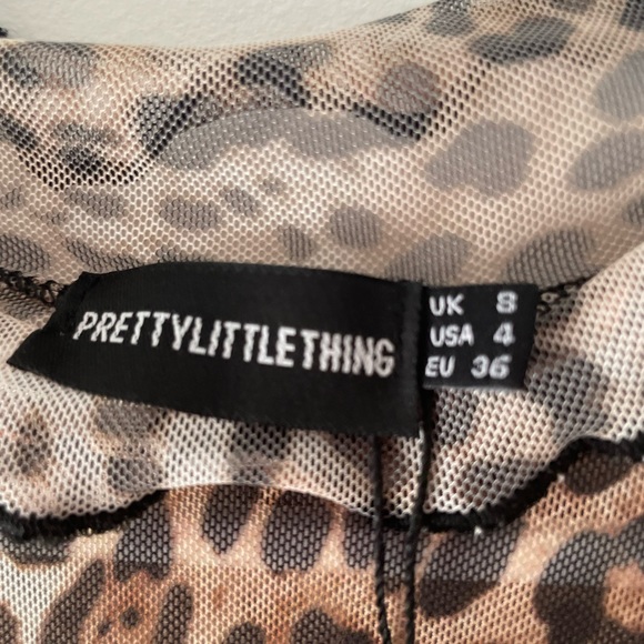 *Mesh leopard rubbed top with ruffled sleeves and neck* - Picture 3 of 3